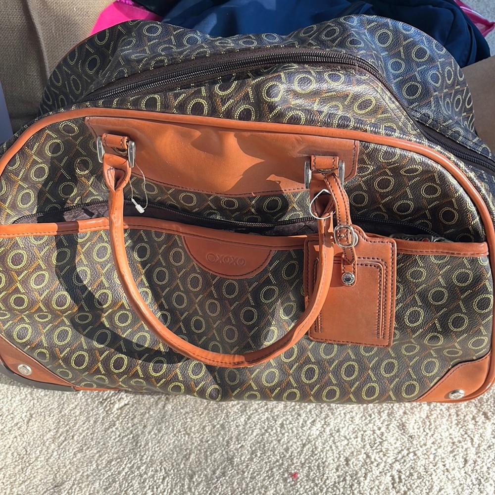 Carry on rolling mini suitcase